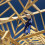En bild på en byggarbetare som klättrar i vad som ser ut som taket på ett högt obyggt hus. Bilden är tagen underifrån.